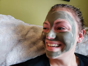 Young woman with 7 Fathoms Seaweed Clay Mask on Her Face